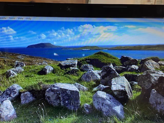 Stone foundations above the bay, from the settlement video guides