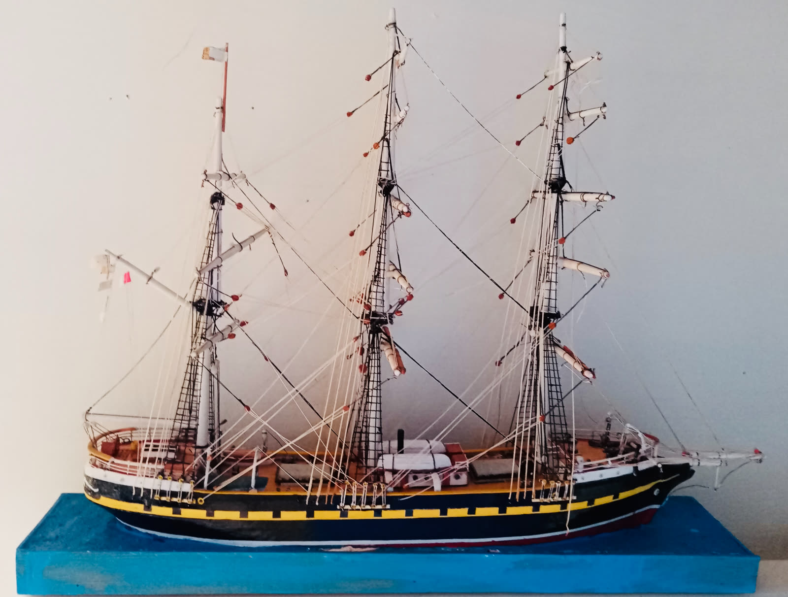 A model three-masted sailing ship